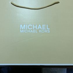 Brand New MK Women Boot Will take 80
