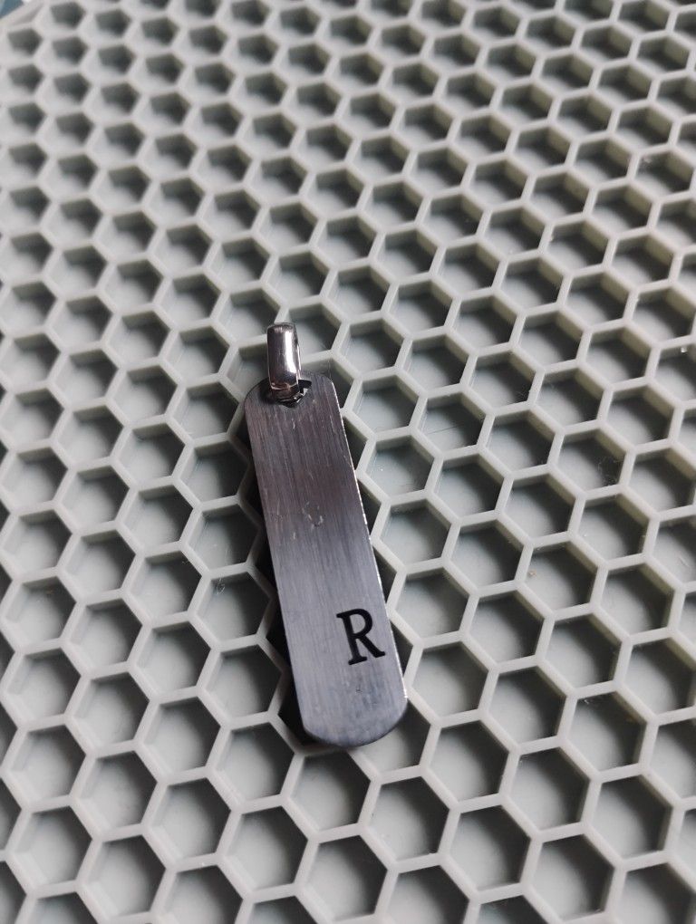 Stainless Steel Pendant With The Letter "R" $1