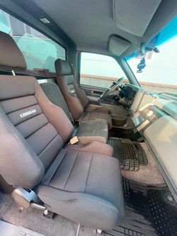 Corbeau bucket seats with the Silverado center console