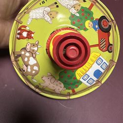Vintage spinning tin top toy farm