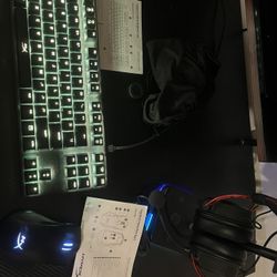RGB HyperX Gaming Keyboard, Mouse, Headset, And A Headset Stand.