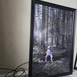 30×43 Astronaut in forest framed wall art