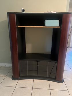 Tall TV stand with ample storage.