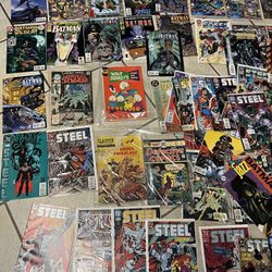 ALL DIFFERENT DC COMICS AND “STEEL.” ALL FROM. THE 90s MINT SOME ARE BAGGED AND BOARDED