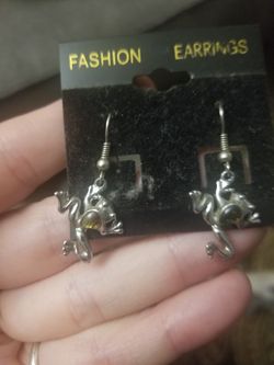 Frog earrings.
