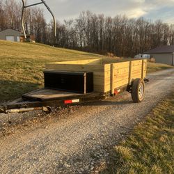 5.5’ x 9’ Utility Trailer with tool box on front
