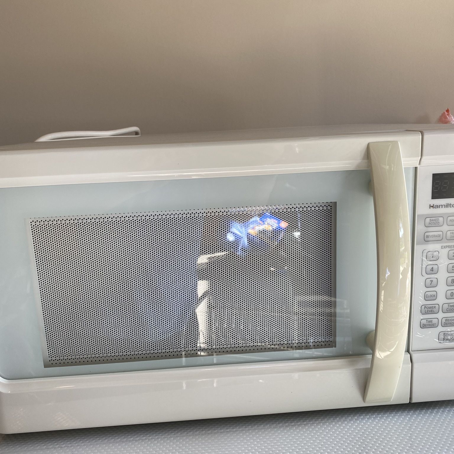 hamilton beach microwave p100n30al