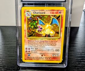 Pokemon cards 1999 Charizard base set CGC6- cash pickup angleton