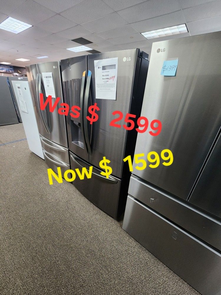 Twenty eight cubic feet three door french door refrigerator with ice and water dispenser craft ice in black stainless steel