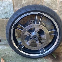 Harley Davidson stock front rim, tire, and rotors