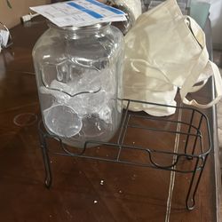 Bottle holder with a big glass jar for events or parties