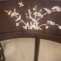 Chinese export–style horseshoe-back armchair, crafted in hardwood with hand-carved pierced splats and mother-of-pearl inlay.