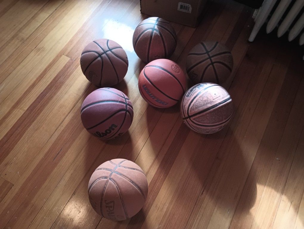 7 Used Basketballs