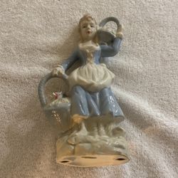 Ceramic maiden statue $10
