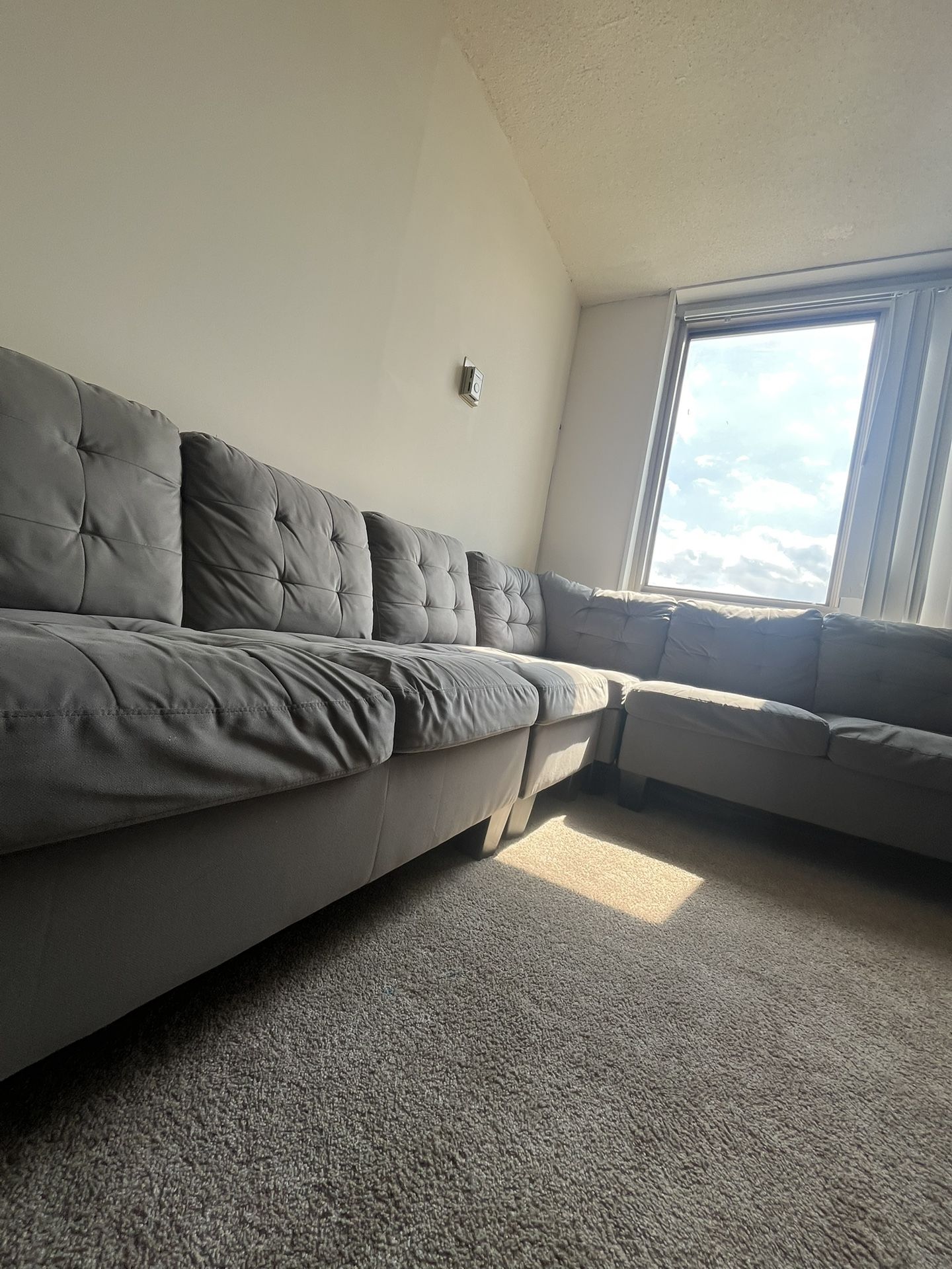 L-Shaped Couch Slightly Used Flexible Price