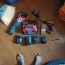 Milwaukee Tool Bundle....4 Batteries, Milwaukee 6 Port Charging Base, Milwaukee SawZall, Milwaukee Drill, Milwaukee Impact Wrench, & Milwaukee 25 PC. 