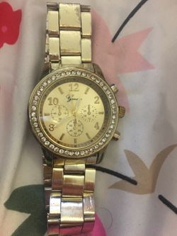 Gold Geneva watch