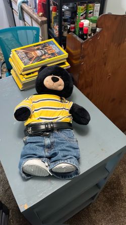 Stuffed bear with jeans, T shirt and tennis shoes