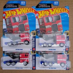 4 Optimus Prime Hot Wheels Lot Transformers.