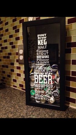 Beer bottle shadow box for man cave or Saving bottle caps while camping!