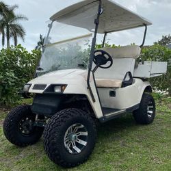 ezgo gold car withcrims and lift kit 600$ firm