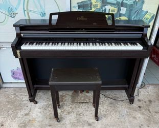 Yamaha Clavinova CLP-811 Digital Piano and stool in dark rosewood