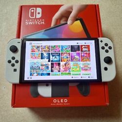 NINTENDO SWITCH OLED with 100 SWITCH GAMES INCLUDED