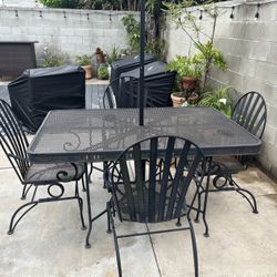  Black table and glider loveseat