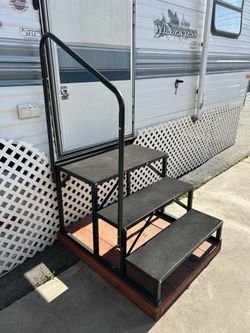 Black Metal Stairs with Hand Rail