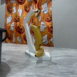 naturally made representation of a banana committing 