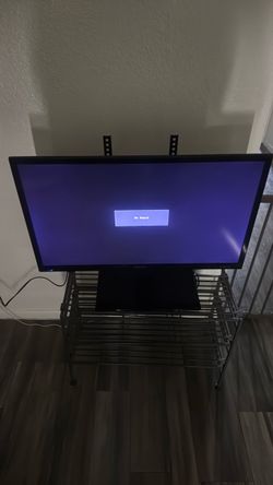 Tv with bolted tv stand