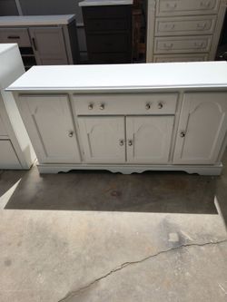 Dresser ,cabinet ,and a small TV stand