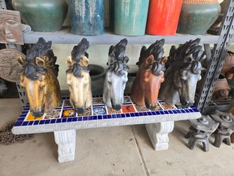 CONCRETE HORSE HEADS $100 EACH