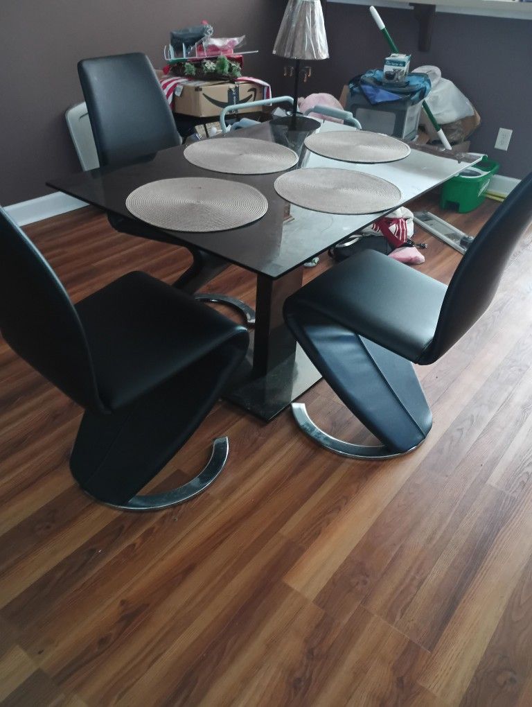 Elegant Dining Room Table With Three Chairs