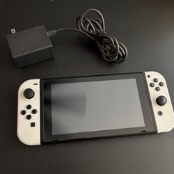Nintendo Switch with Charger and 128SD Card -