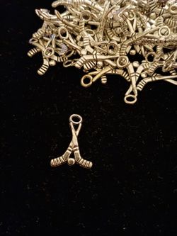 90- Hockey stick charms