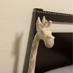 Two Wooden Giraffe Statues