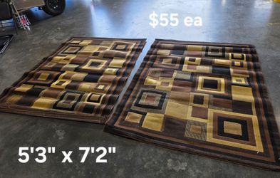 5'3" x 7'2" area rugs $40 ea
Modern design in black and brown