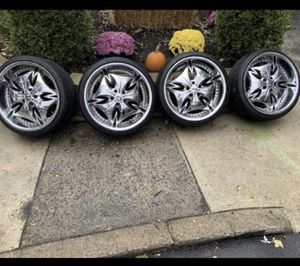 Photo 4 DUBZ tires and 4 factory infinity tires for CHEAP!!