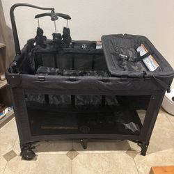 babyGap Deluxe Play Yard by Delta Children - Features a Removable Bassinet and Changing Table, Black Camo