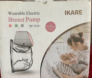 Ikare wearable electric breast pump color pink