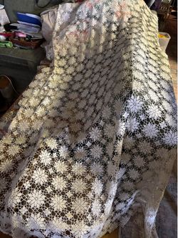 Hand qureshed off white table cloth 74” by94”.