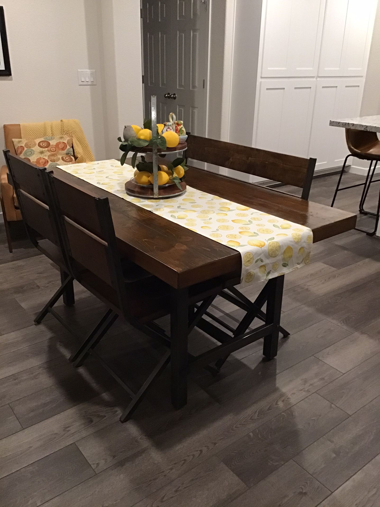 Farmhouse style dining table with chairs and bench