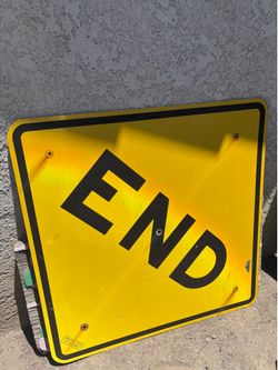 Large metal END sign