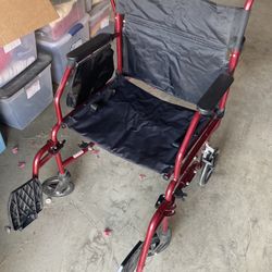 Red wheelchair / Transpirtation Chair with pedals Light Weight Really Good Condition 