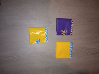 Three duct tape wallets