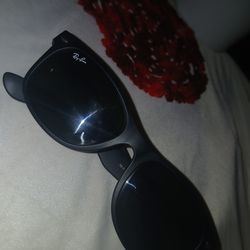 Black Ray-Ban sunglasses in good condition.