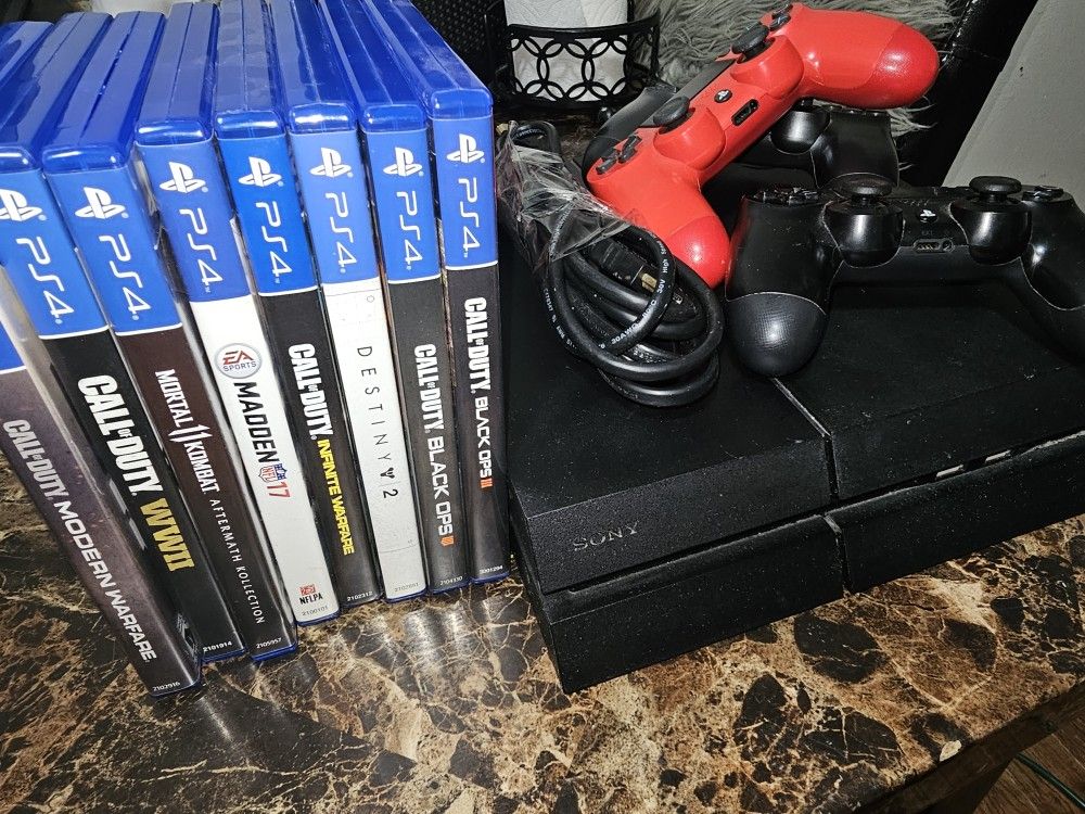 PS4, 3 Controllers, 8 Games For Sale