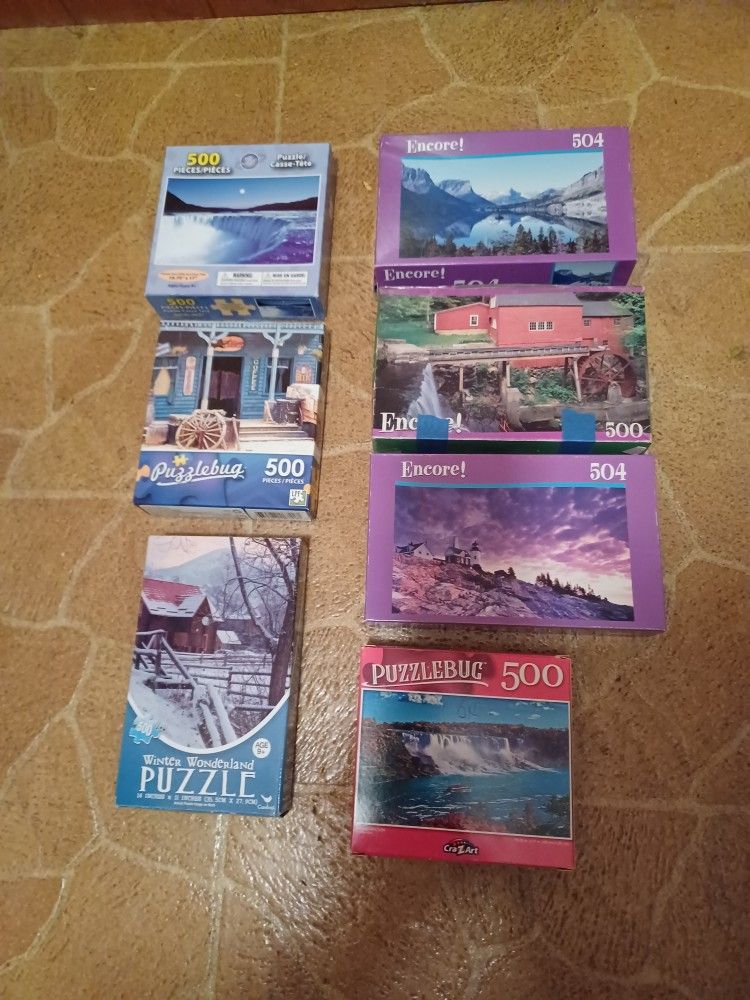 Seven 500 Piece Puzzles