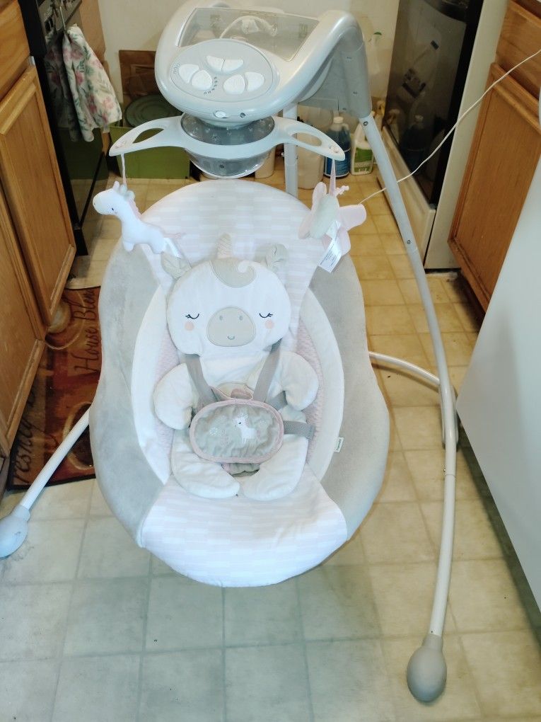 Ingenuity InLighten Baby Swing, Easy-Fold Frame, Swivel Infant Seat, Lights - Flora the Unicorn (Pink)